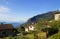 mediterranean scenery with Italian village overlooking lake Garda and Italian Alps in Tignale, Lombardy, Northern Italy