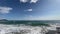 Mediterranean sea with blue sky and white clouds