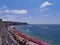 The mediterranean sea coast at Alexandria, Egypt with a skyline of the city buildings