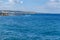 Mediterranean Sea and a coastline with seaside villages in the distance