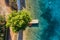 Mediterranean sea. View on the berth from drone. Aerial view of floating boat on blue sea at sunny day.