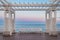 Mediterranean Sea and white colonnade on Promenade des Anglais at sunset in Nice France