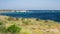 Mediterranean seascape of Favignana coastline with Punta Longa village and Sicily coastline