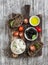 Mediterranean snack - mozzarella, olives, rye ciabatta bread, cherry tomatoes