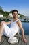 Mediterranean young man relaxed on wood pier