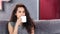 Medium close-up relaxed beautiful young woman enjoying drinking morning coffee at home