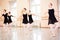 Medium group of teenage girls practicing classical ballet