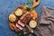 Medium rare beef steak is cut on a cutting board. View from above