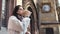 Medium shot female tourist drinking paper coffee cup admiring amazing medieval architecture