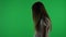 Medium side view green screen, chroma key shot of a posessed female figure, ghost, poltergeist, zombie standing still