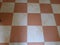 Medium size white and brown floor tiles