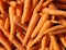 Medium-sized clean orange carrots, top view, full screen