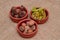 Medlar, linden and walnut in earthenware casserole dishes