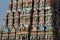 Meenakshi hindu temple in Madurai, Tamil Nadu, South India. Sculptures on Hindu temple gopura (tower). It is a twin temple, one o