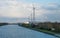 Meerhout, Belgium - View over the industry and electric wind mills at the banks of the Albert Canal