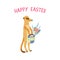 Meerkat holding wicker basket full of colorful Easter eggs,
