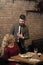 Meet, proposal and anniversary. Valentines day with woman and bearded man. Couple in love meet at restaurant