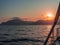 Meet the sunset in the Bay on Board the yacht, a romantic evening at sea. Boat trip on a yacht under sail.