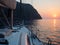 Meet the sunset in the Bay on Board the yacht, a romantic evening at sea. Boat trip on a yacht under sail.