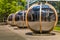 Meeting pods in Chiswick Business Park offer private group discussions for employees amid the relaxing, green park. BSI building