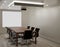 Meeting room with white wall, wooden floor ,projector machine