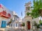 Megali Panagia or Metropolitan Greek Orthodox church of Mykonos, Cyclades, Greece in Alefkandra square. Greek flag