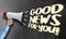 Megaphone or bullhorn against chalkboard with text GOOD NEWS FOR YOU