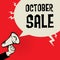 Megaphone Hand, business concept with text October Sale