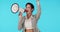 Megaphone, protest and announcement with a woman shouting in studio on a blue background for support at a rally. Noise