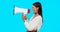 Megaphone, voice and announcement of woman isolated on blue background broadcast, breaking news and loud opinion. Indian