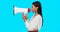 Megaphone, voice and announcement of woman isolated on blue background broadcast, breaking news and loud opinion. Indian