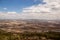 Megido valley, Armageddon battle place with empty fields, cloudy sky, Israel