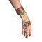 Mehendi or henna tatoo on the female hands in bracelets