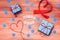 Mejor papa words that mean best dad in spanish made of wooden blocks with blue gift boxes and red hearts on wooden background.