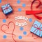 Mejor papa words that mean best dad in spanish made of wooden blocks with blue gift boxes and red hearts on wooden background.