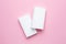 Melamine sponges on pink background, minimalism , white figure, kitchen and home cleaning