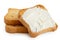 Melba toast with cream cheese lying on two plain toasts isolated