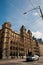 MELBOURNE, AUSTRALIA - JULY 26, 2018: Grey Audi car with ancient Windsor heritage hotel in Melbourne Australia