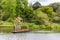 Melbourne Botanical Gardens with tourists boating on a Gondala