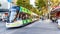 A Melbourne city tram is crossing Swanston Street