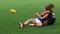 Melbourne player Cat Phillips passing the footy pressured by Carlton player Georgia Gee at Ikon Park Stadium