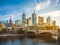 Melbourne`s city view with the historic Princes Bridge and modern building towers over Yarra River in morning sunlight