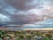 Melbournes suburbs and CBD looking down at Houses roads and Parks Victoria Australia. Beautiful colours at Sunset