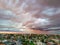 Melbournes suburbs and CBD looking down at Houses roads and Parks Victoria Australia. Beautiful colours at Sunset