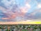 Melbournes suburbs and CBD looking down at Houses roads and Parks Victoria Australia. Beautiful colours at Sunset