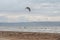 Melbystrand Sweden A kitesurfer practise his surfing skills close to beach with sand dunes