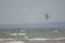 Melbystrand Sweden A kitesurfer practise his surfing skills close to beach with sand dunes