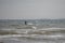 Melbystrand Sweden A kitesurfer practise his surfing skills close to beach with sand dunes