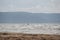 Melbystrand Sweden A windsurfer practise his surfing skills close to beach with sand dunes