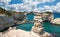 Melendugno,province of Lecce, Puglia, Italy. August 2021. The stacks of Sant`Andrea are a point of naturalistic attraction: the